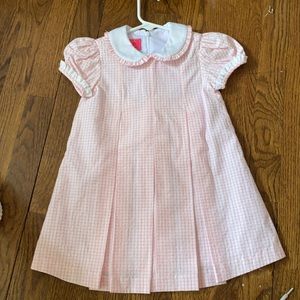 Claire and Charlie pink window pane pleat dress